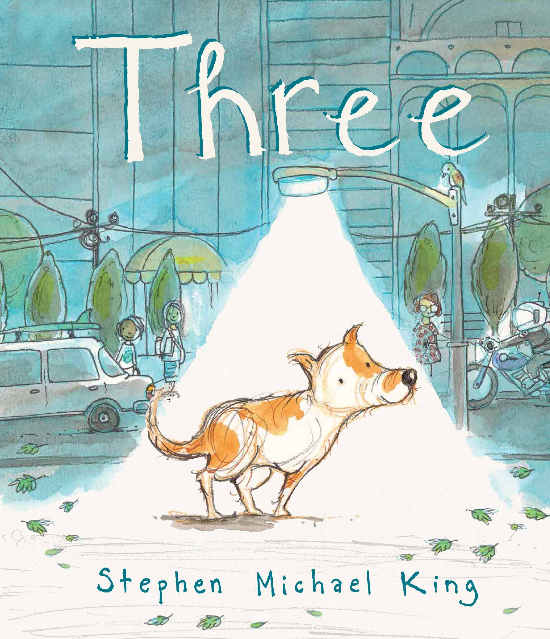 Cover image of the children's picture book Three. an orange and white dog missuing his front right leg stands under the light of a street lamp